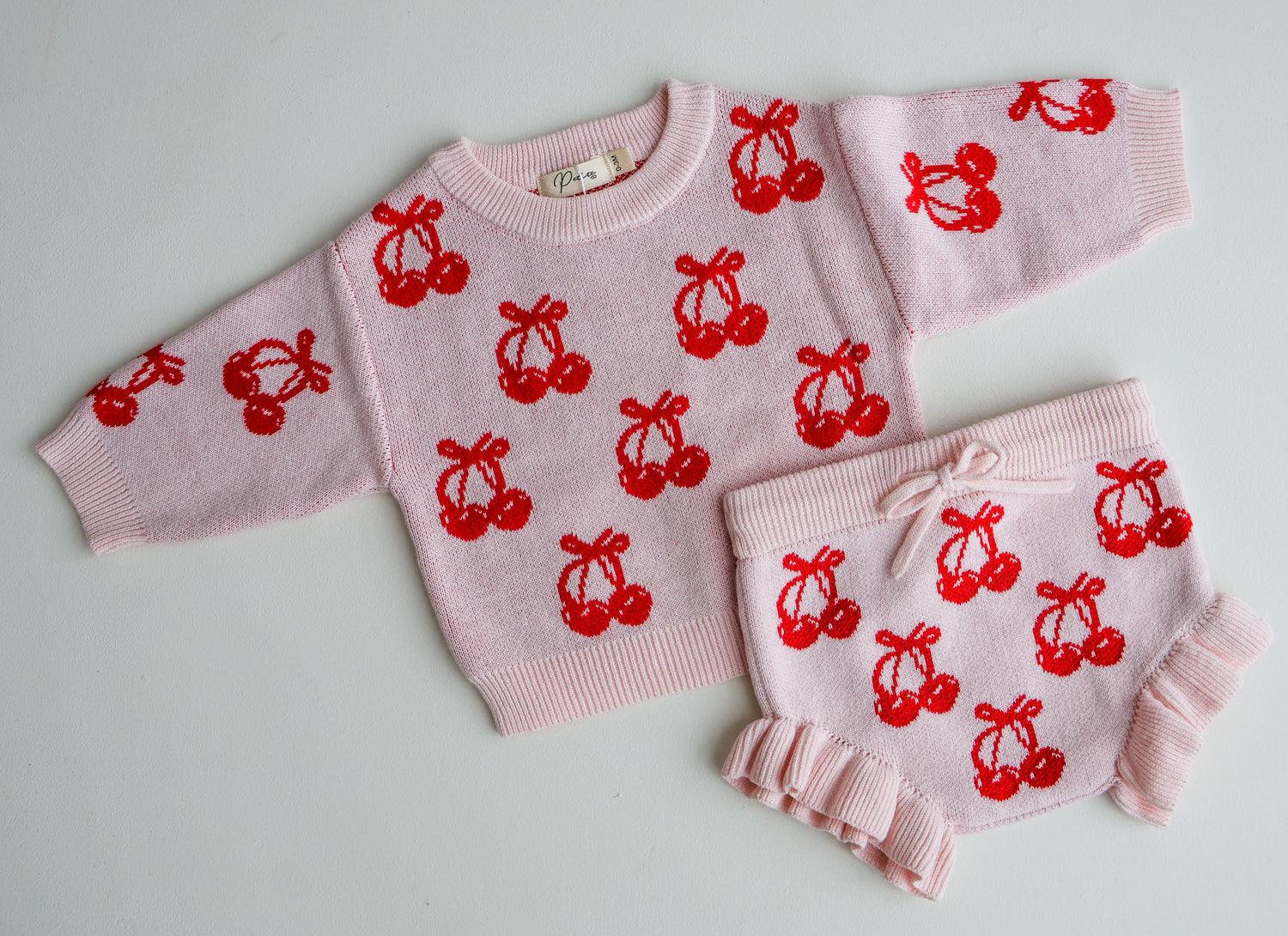 CHERRY BOW JUMPER