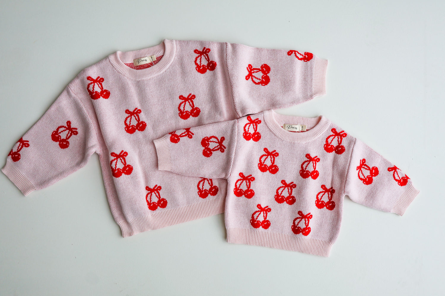 CHERRY BOW JUMPER