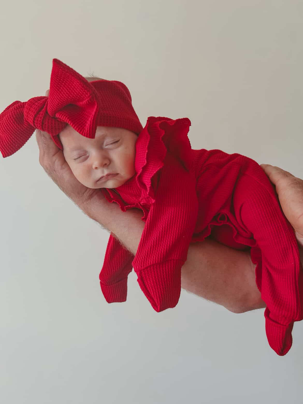 FLUTTER RUFFLE ONESIE | RED