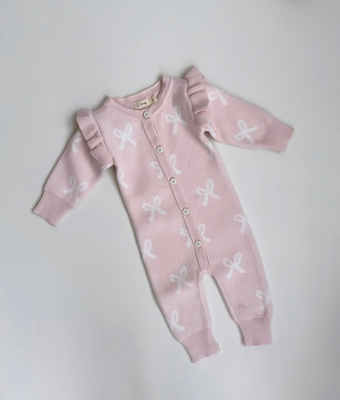 LONG FLUTTER BOW ROMPER | BABY PINK
