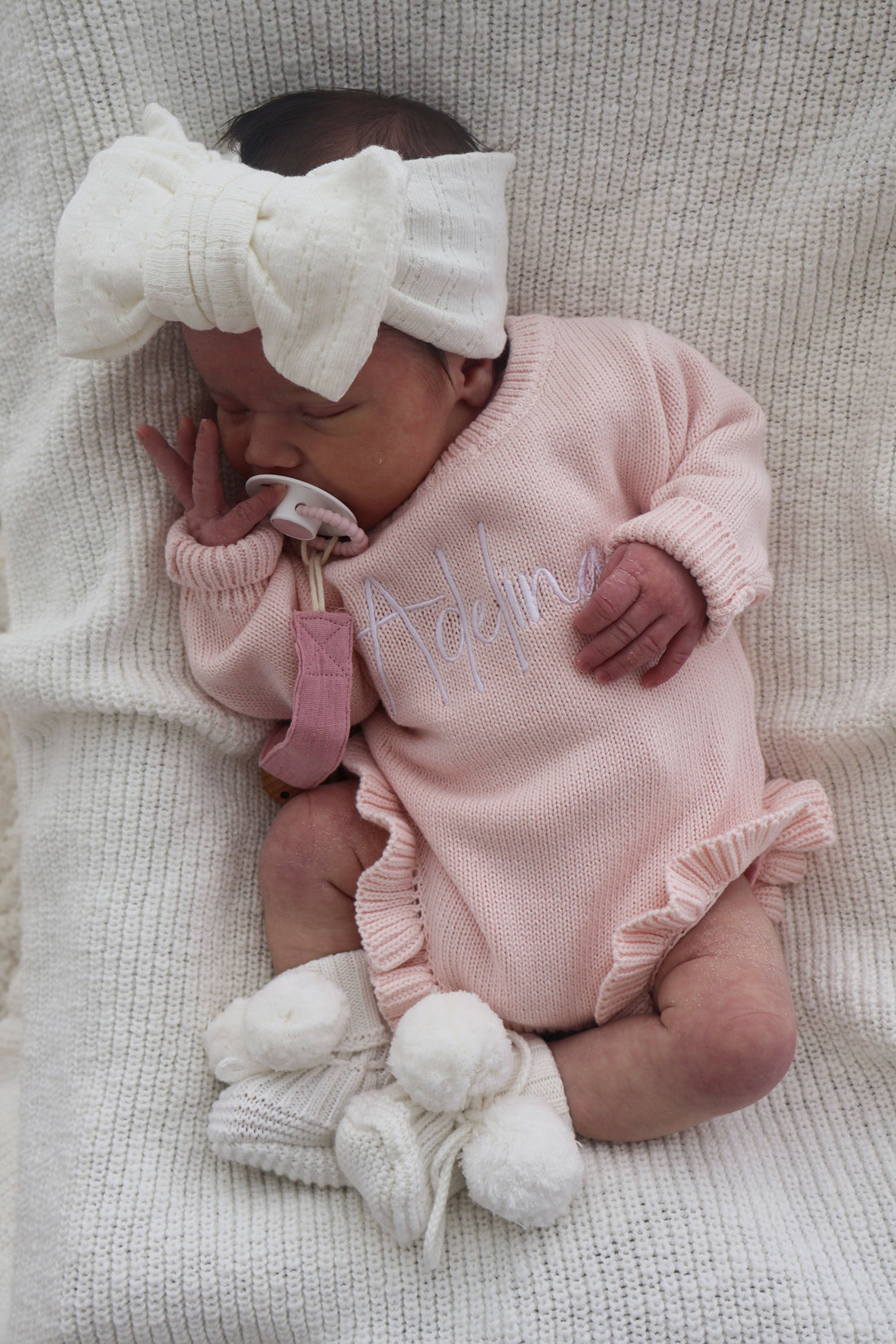 CLASSIC BIRTH ANNOUNCEMENT FRILL ROMPER - BABY PINK