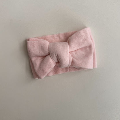 Fine knit cotton newborn baby bow headband in baby pink — Petite + Co