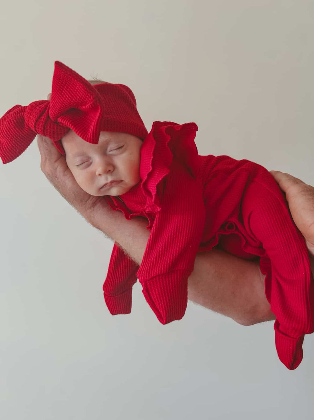 FLUTTER RUFFLE ONESIE | RED