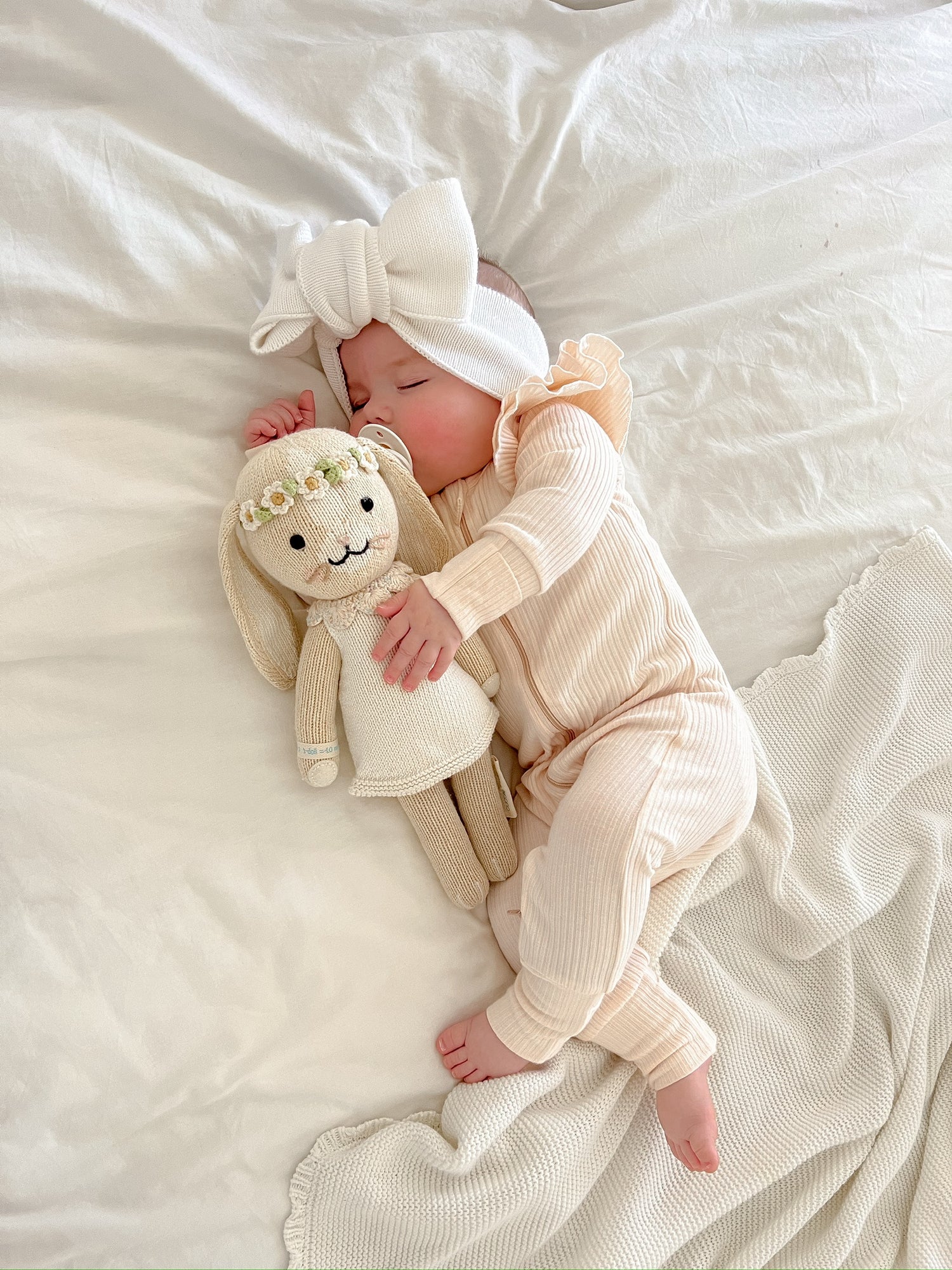 FLUTTER RIBBED ONESIE | SOFT PEACH