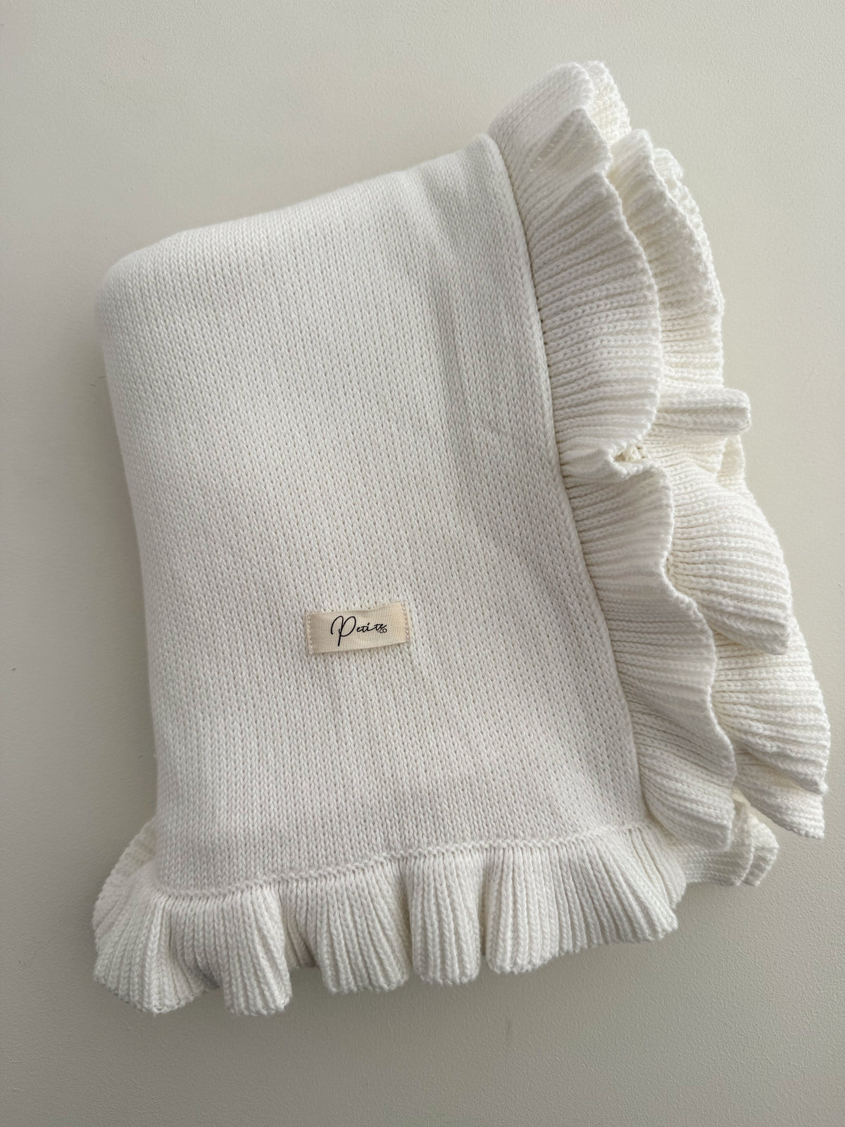 FINE KNIT FRILL BLANKET | MILK