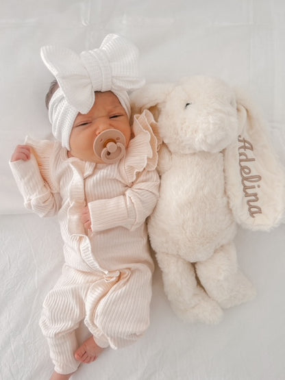 FLUTTER RUFFLE RIBBED ONESIE | SOFT PEACH