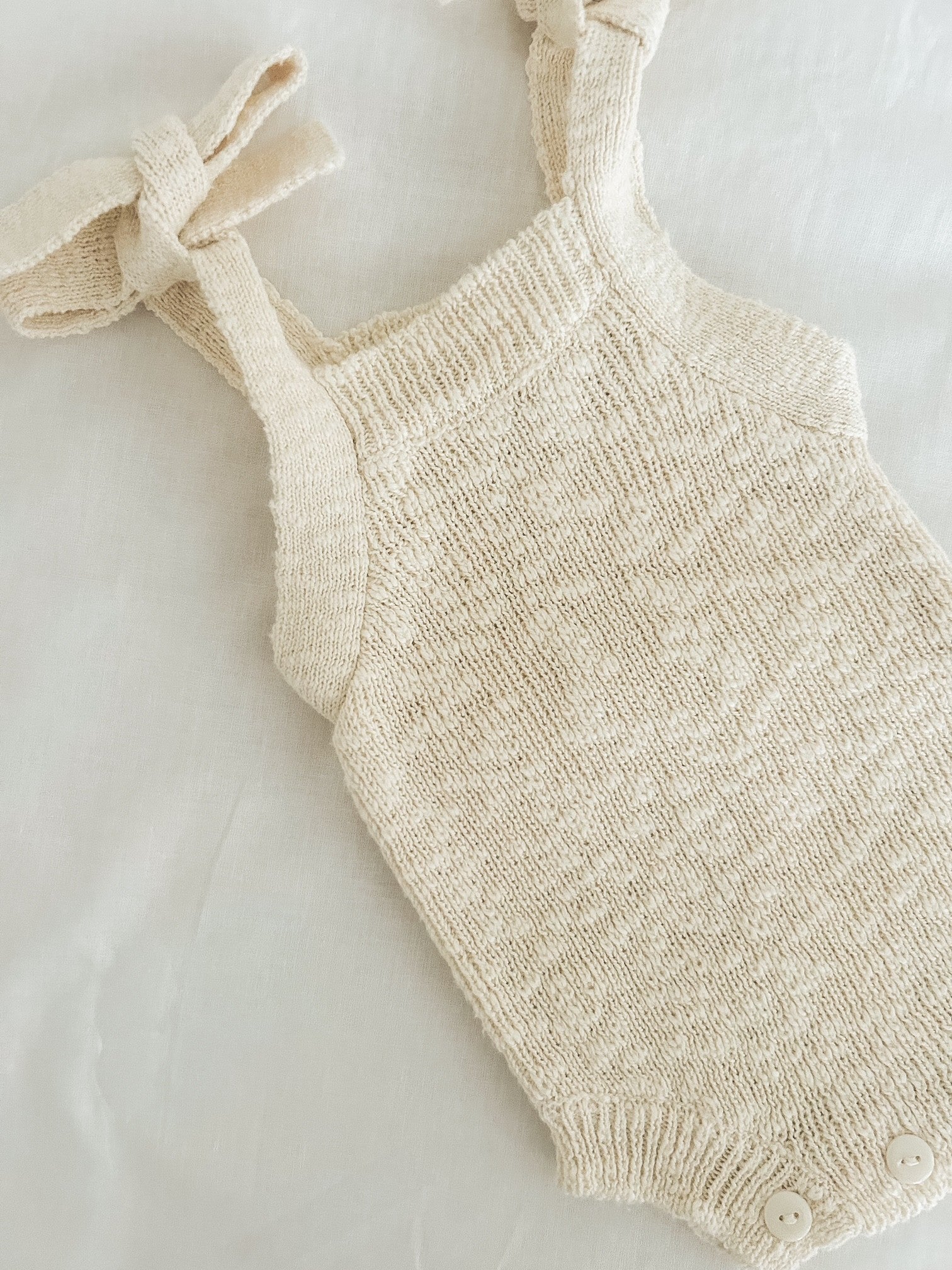 TEXTURED COTTON TIE ROMPER - SAND