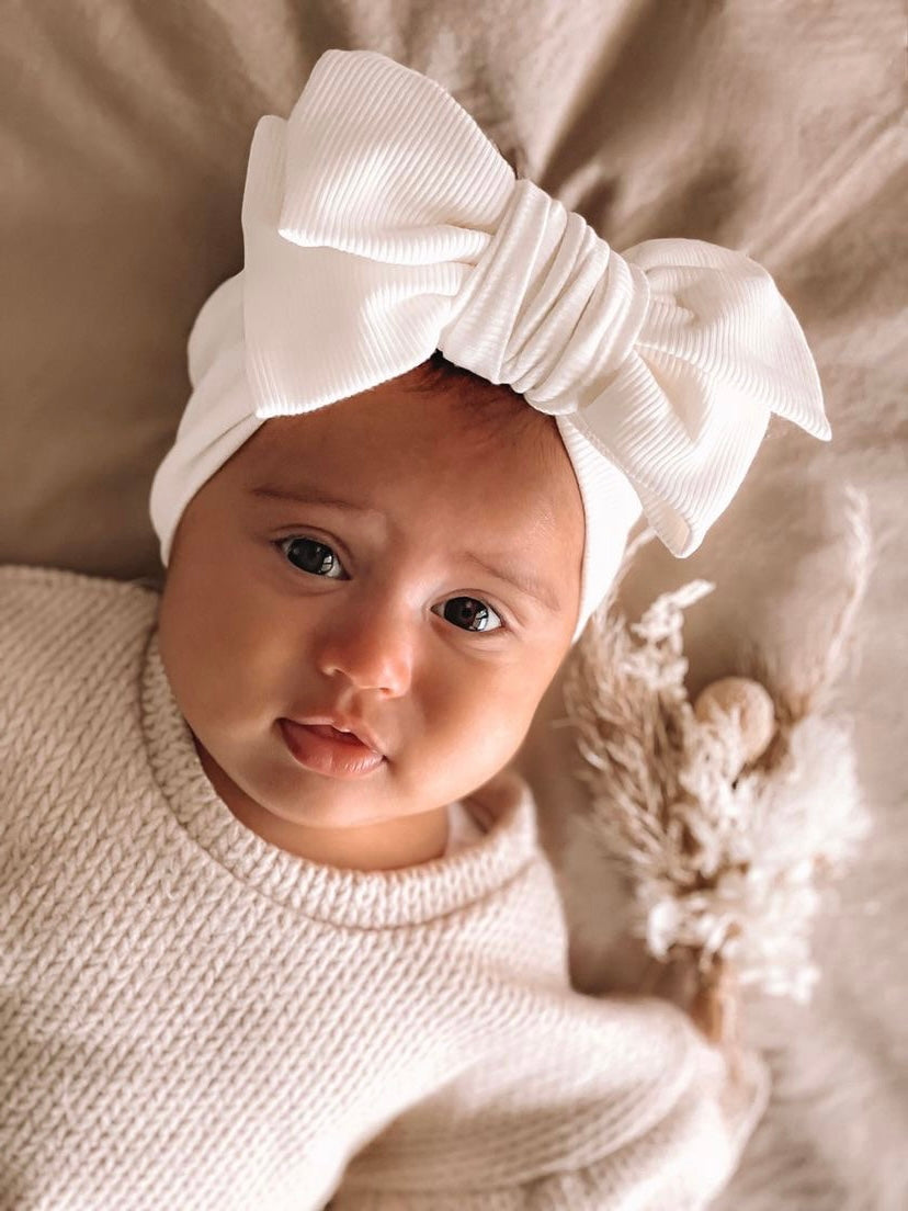 OVERSIZED RIBBED COTTON TOPKNOT BOW HEADBAND - WARM WHITE